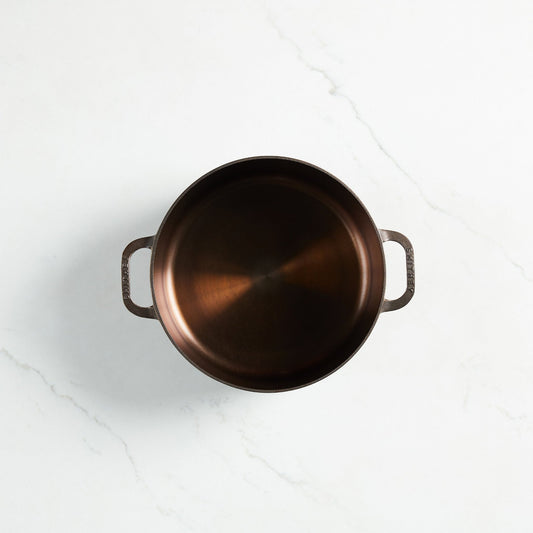 Buy a Smithey 7.25 Qt Dutch oven with a polished interior.