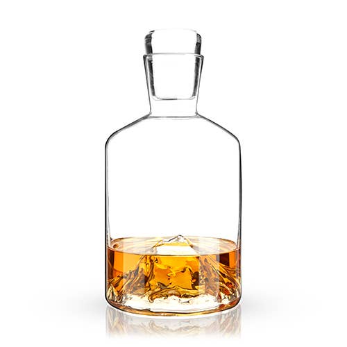 Buy one (1) unique decanter with a hand-blown, multidimensional mountain in the base.