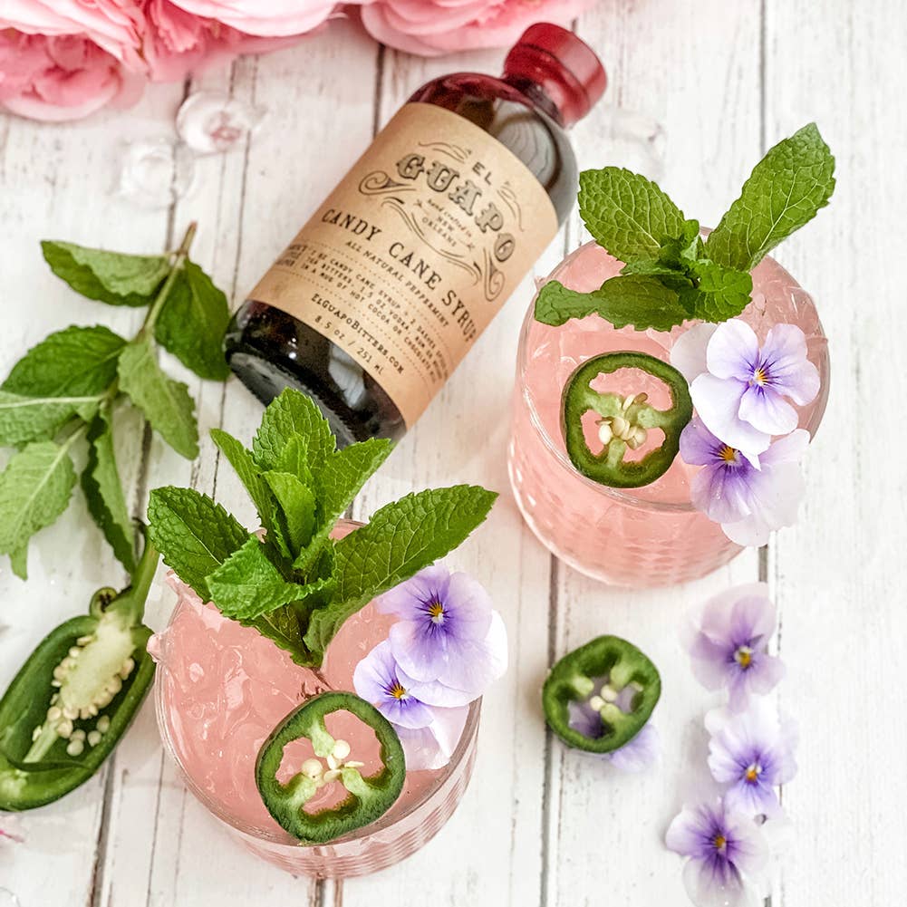 Candy cane syrup will make cocktails and mocktails a blushing shade of pink.