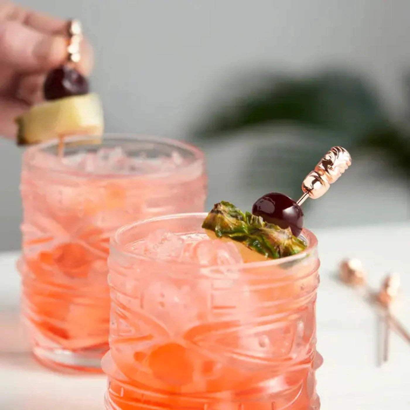 Buy one (1) set of four tiki cocktail garnish picks.