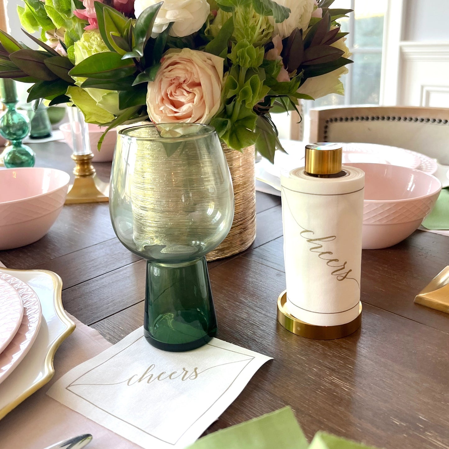 Buy 1 (one) set of elegant white cocktail napkins with gold lettering and a matching gold towel stand (included).