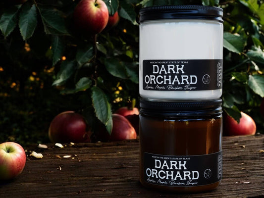 Buy 1 (one) Dark Orchard candle in either clear or amber jars.