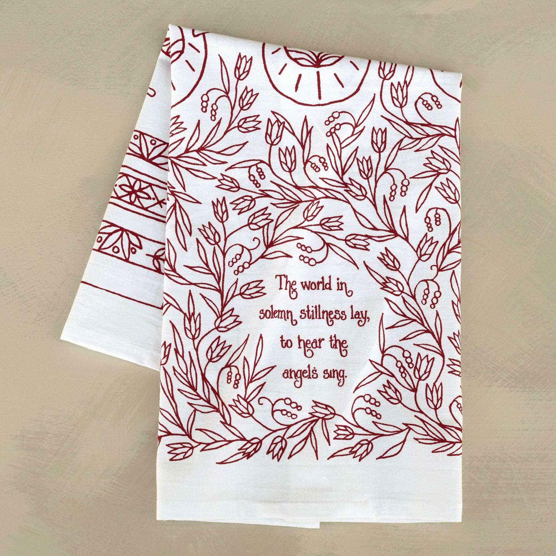 This towel has two sets of lyrics from popular Christmas season songs.