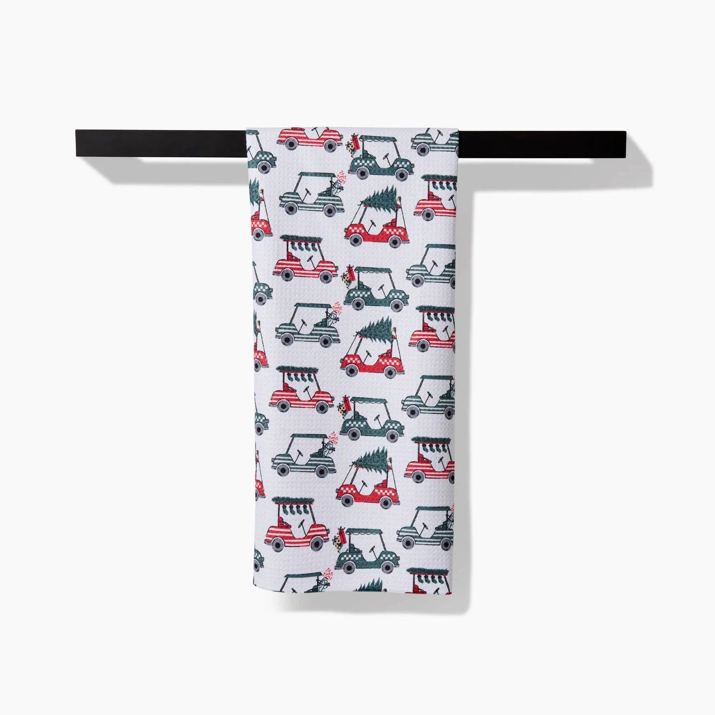 Bring holiday vibes to your winter home with this golf themed tea towel.