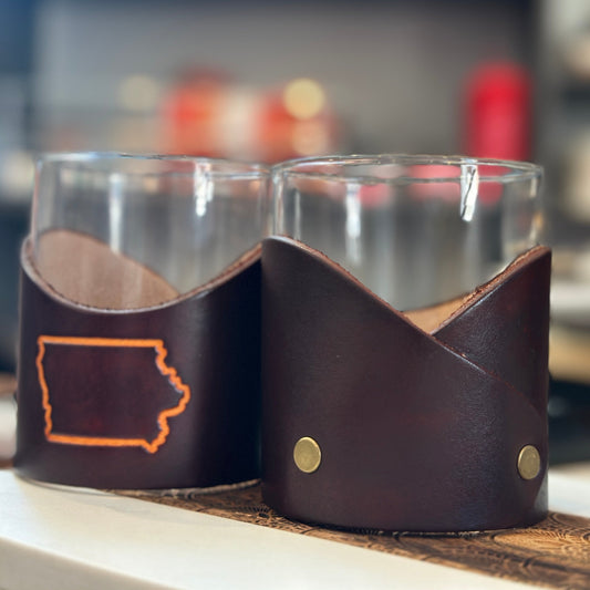 Two glasses (each sold separately) are pictured here, one showing the craftsmanship on the backside.