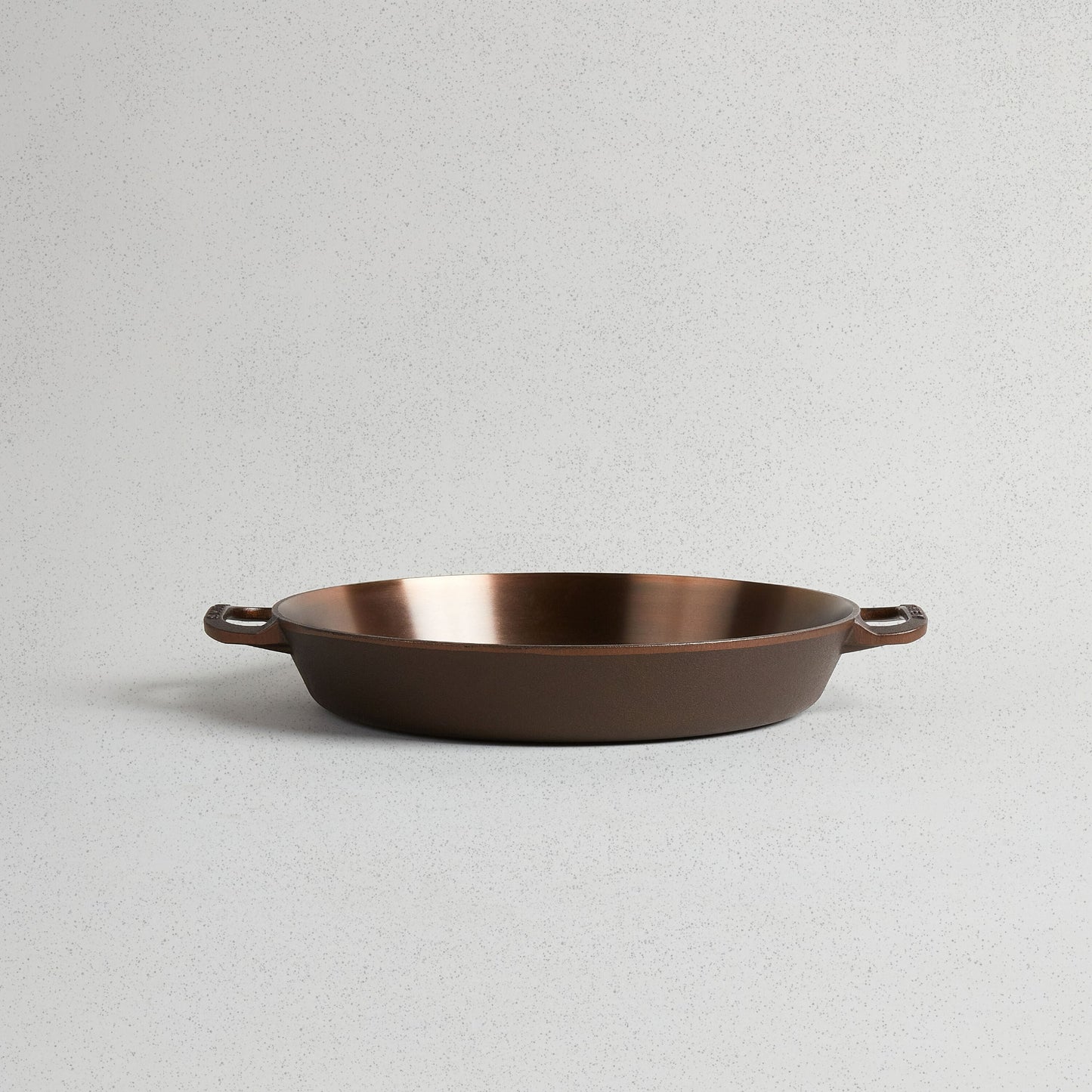 The No. 14 dual handle skillet has a polished interior that's naturally nonstick.