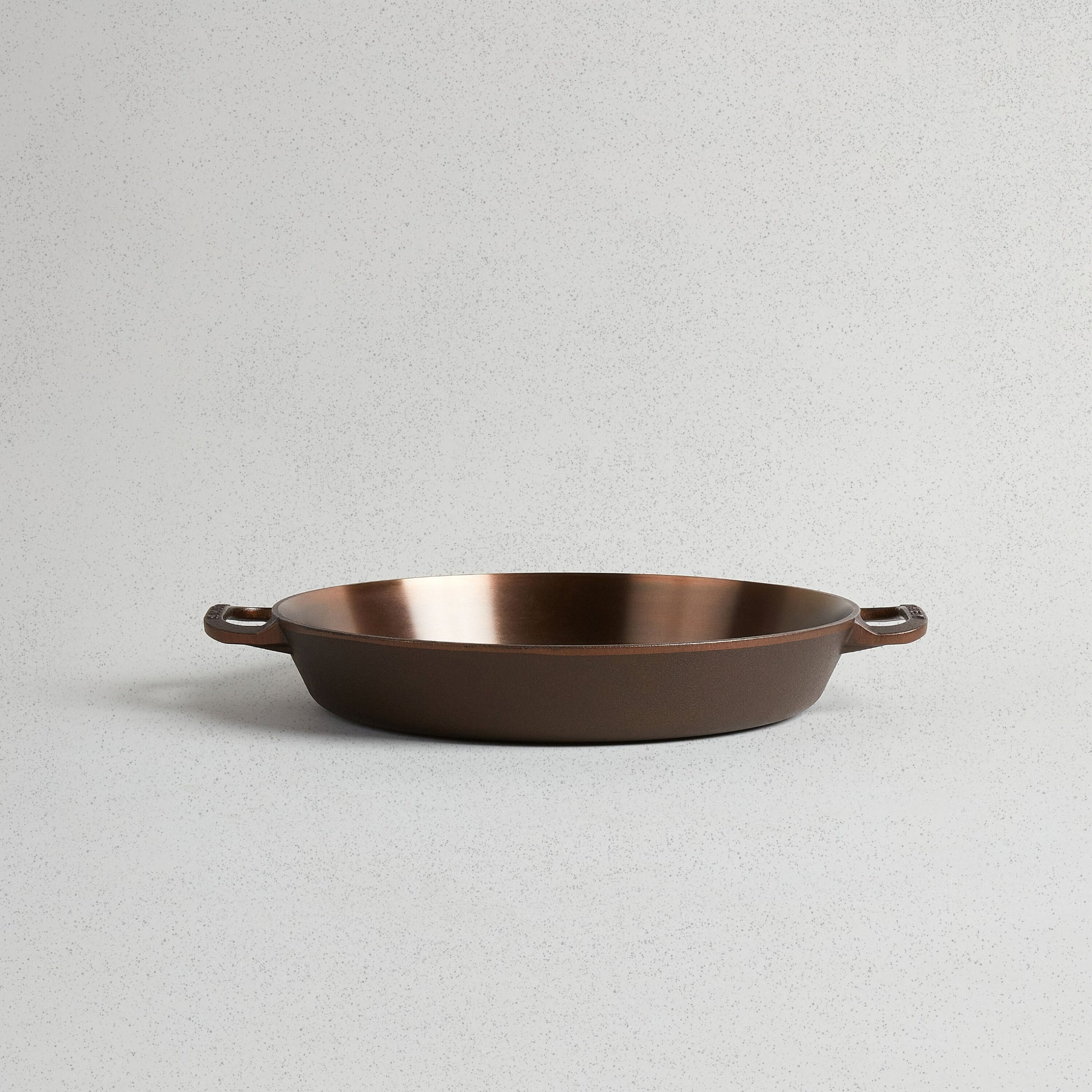 Buy 1 (one) dual handled skillet with polished cast iron cooking surface.