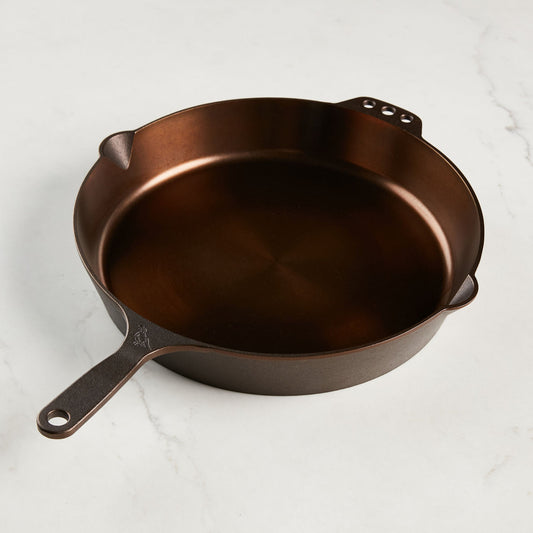 Buy 1 (one) 14-inch cast iron skillet with convenient pour spouts.