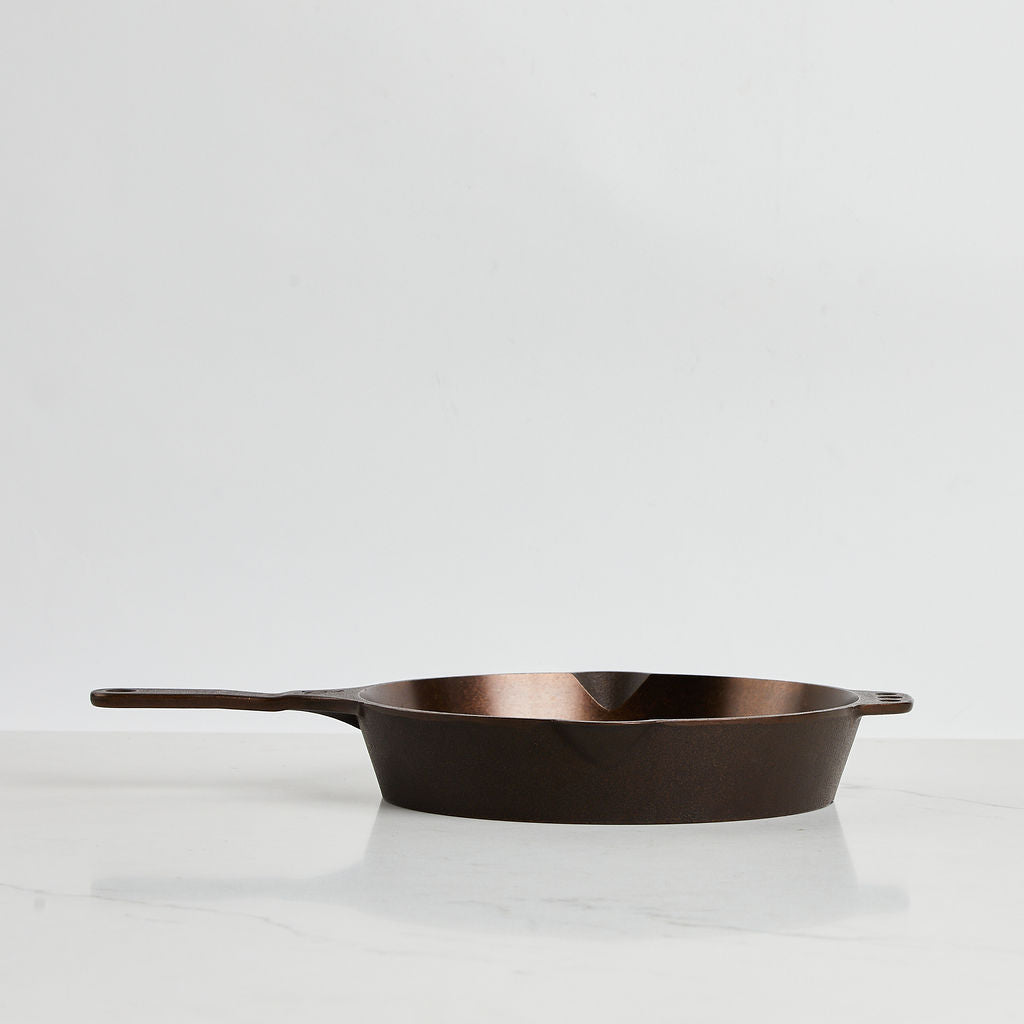 Smithey's No. 10 skillet has a beautiful polished finish that will age to black over time.
