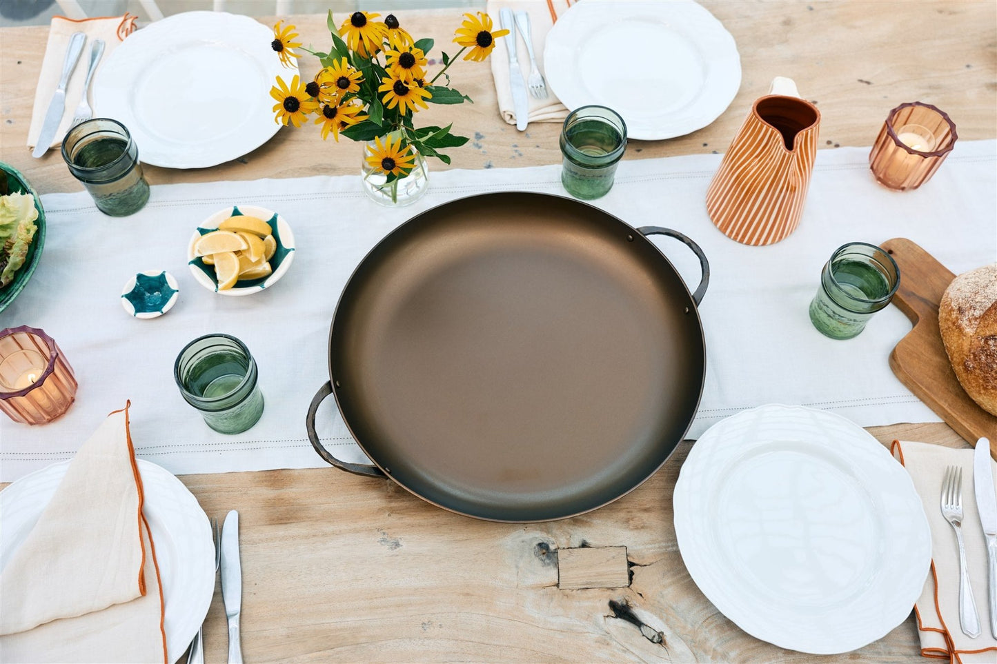Buy one (1) Smithey Paella Pan for party-sized meals.