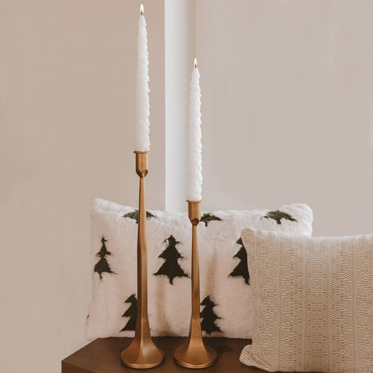 Pair these tapered candles with gold candle holders, sold separately.