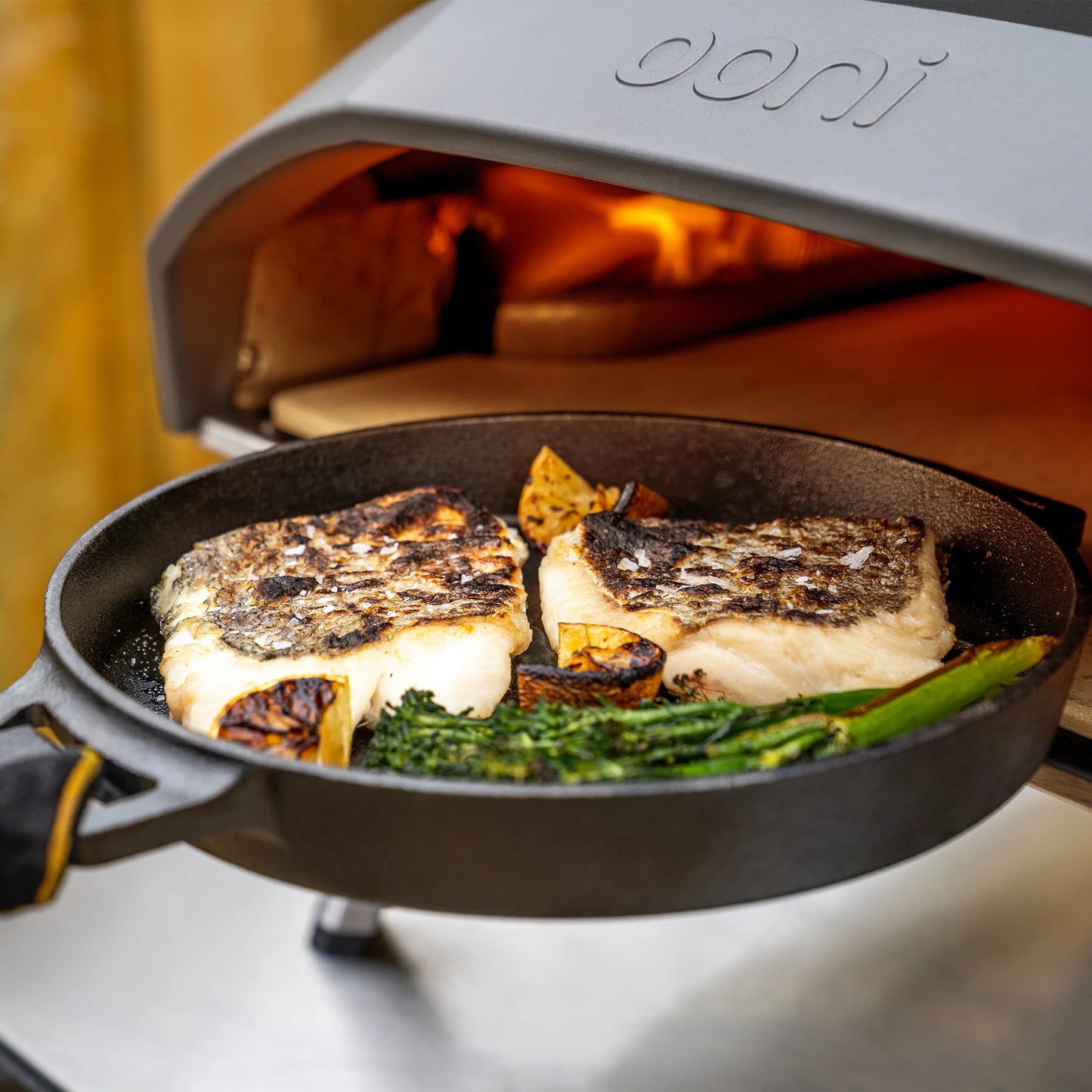 With a cast iron skillet, your pizza oven becomes an all-purpose cooker.