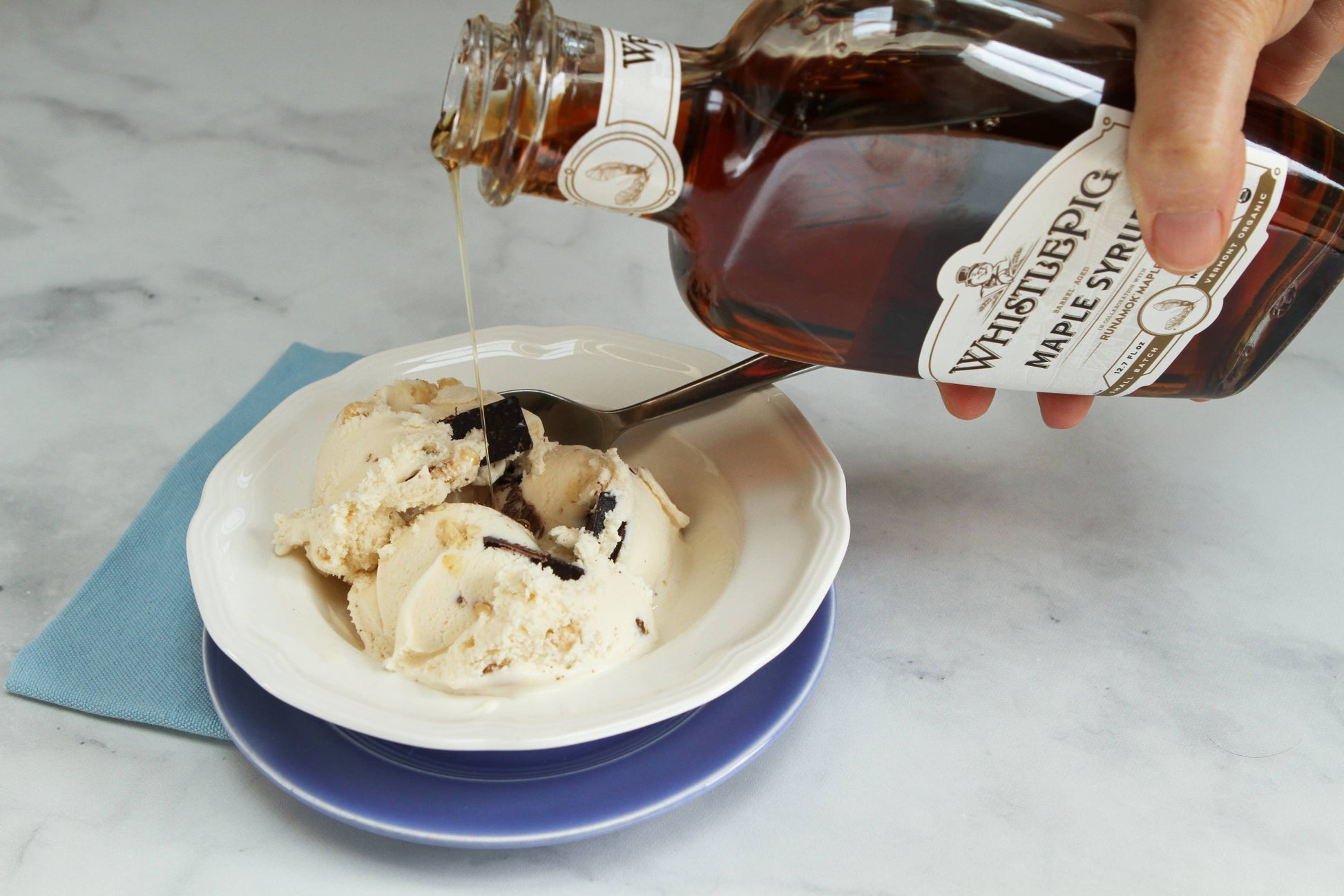 Enjoy WhistlePig maple syrup drizzled over vanilla bean ice cream.