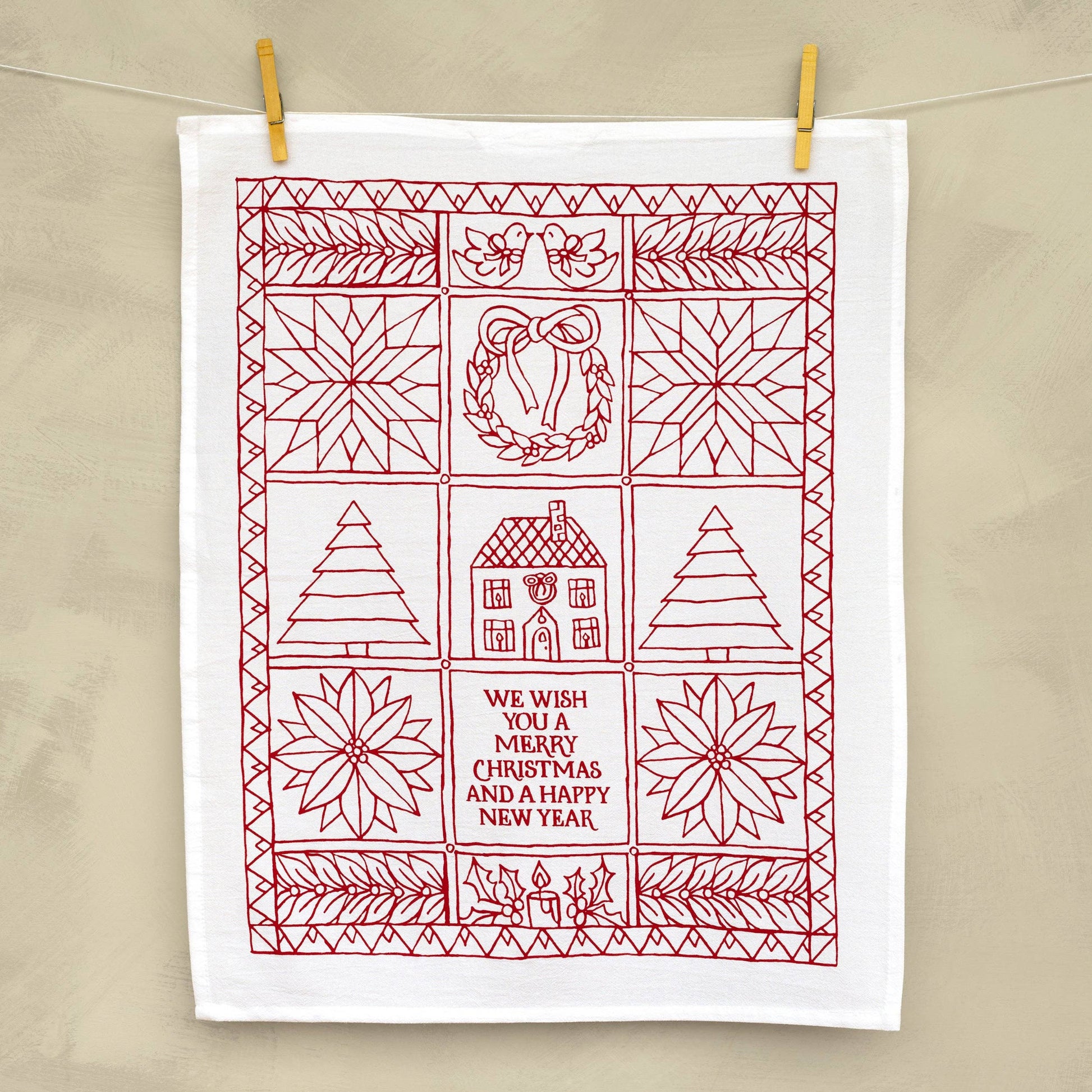 Smile every time you pass by this festive holiday tea towel in your kitchen.
