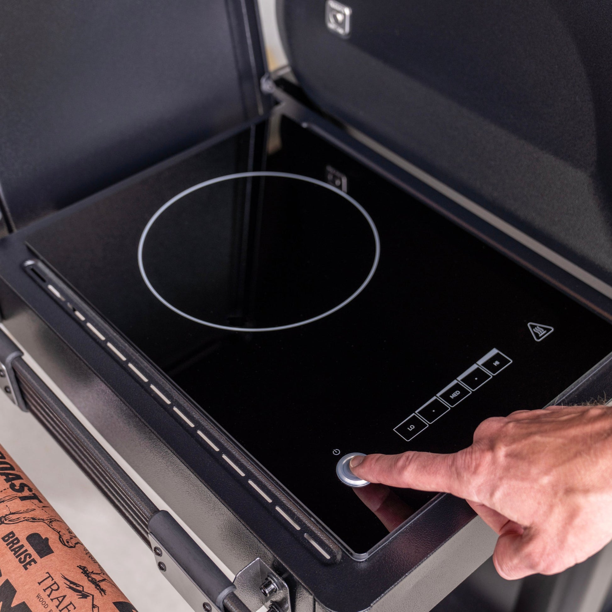 The Traeger Woodridge Elite's searing station is perfect for searing meat like ribeye steak.