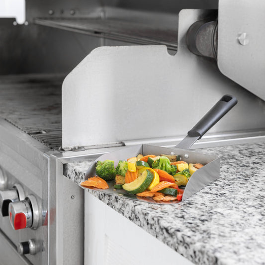 Scoop veggies easily with a five-cup griddle scoop.