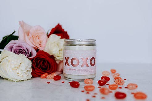 Buy 1 (one) XOXO citrusy candle.