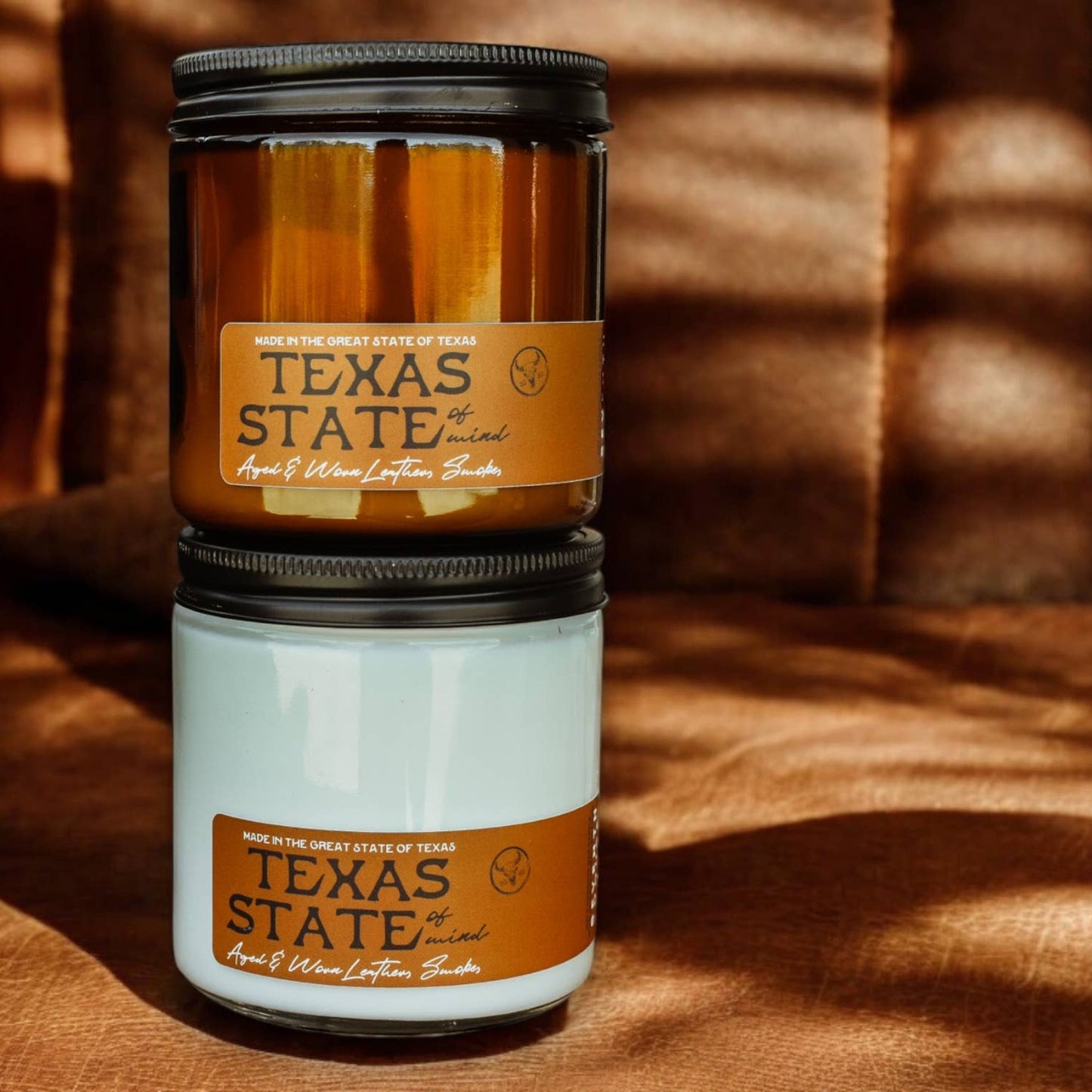 Texas State of Mind candle (1) with aromas of leather and smoke.