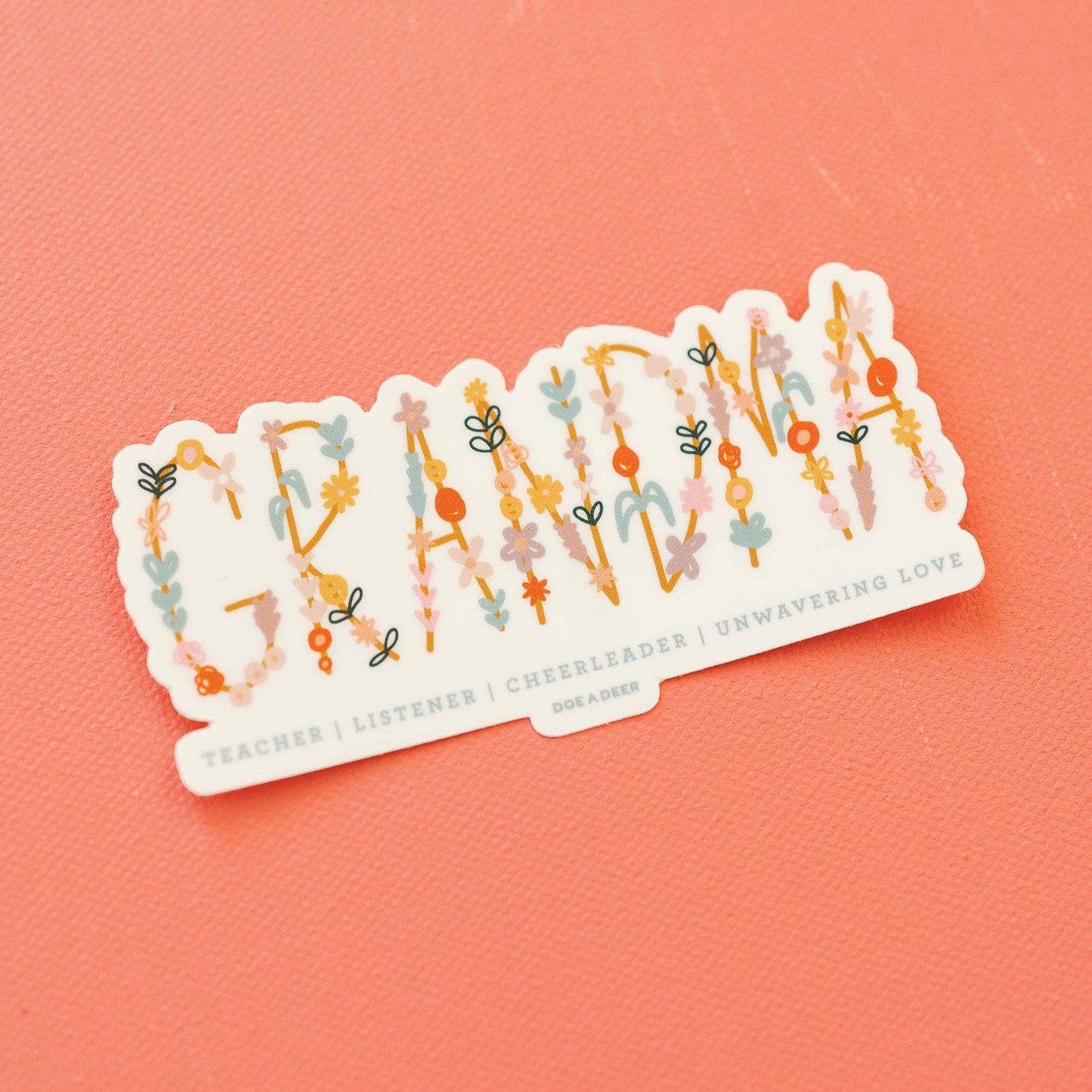 Buy one colorful vinyl sticker that spells GRANDMA and says," Teacher | Listener | Cheerleader | Unwavering Love"