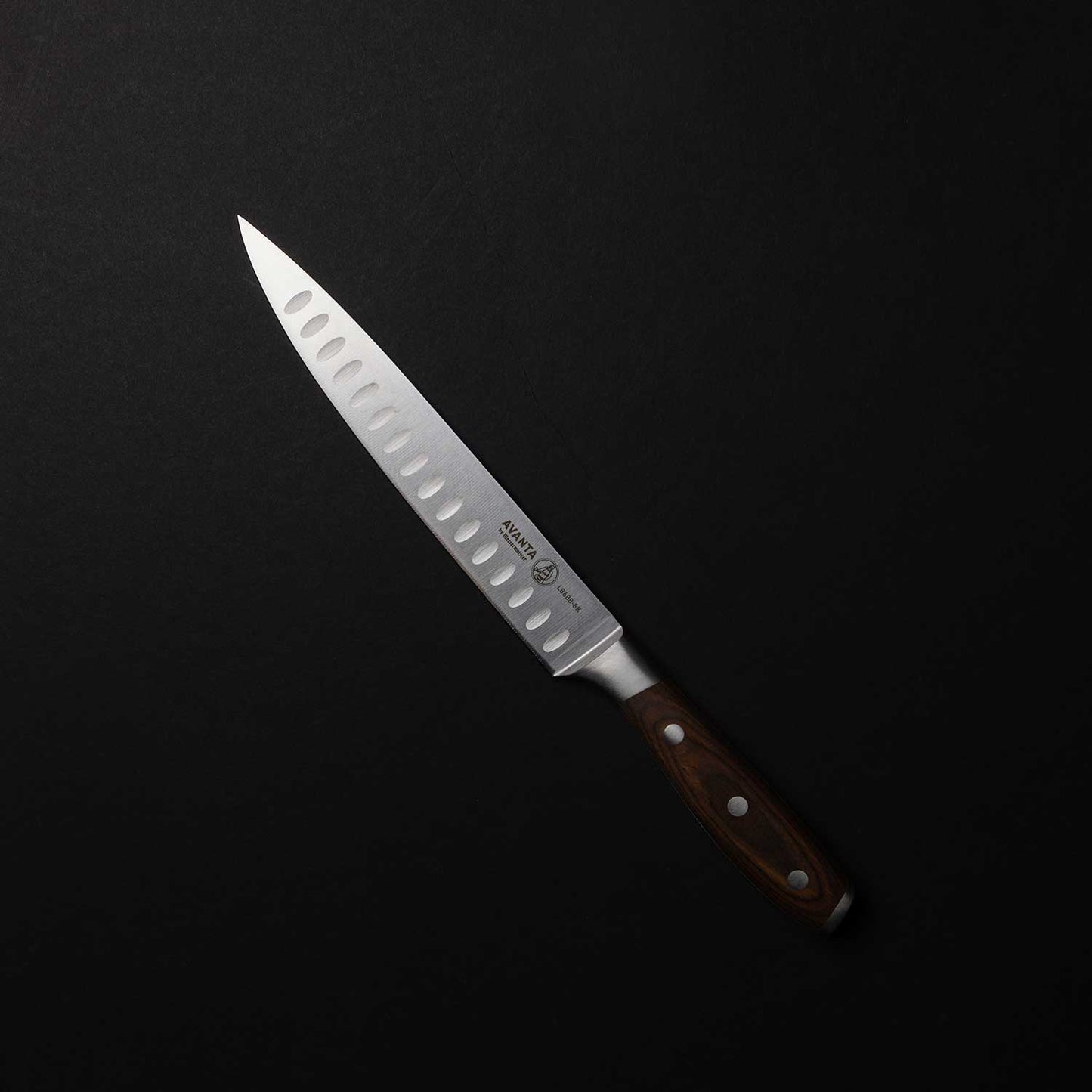 This pointed carving knife is essential for Thanksgiving turkey carving.