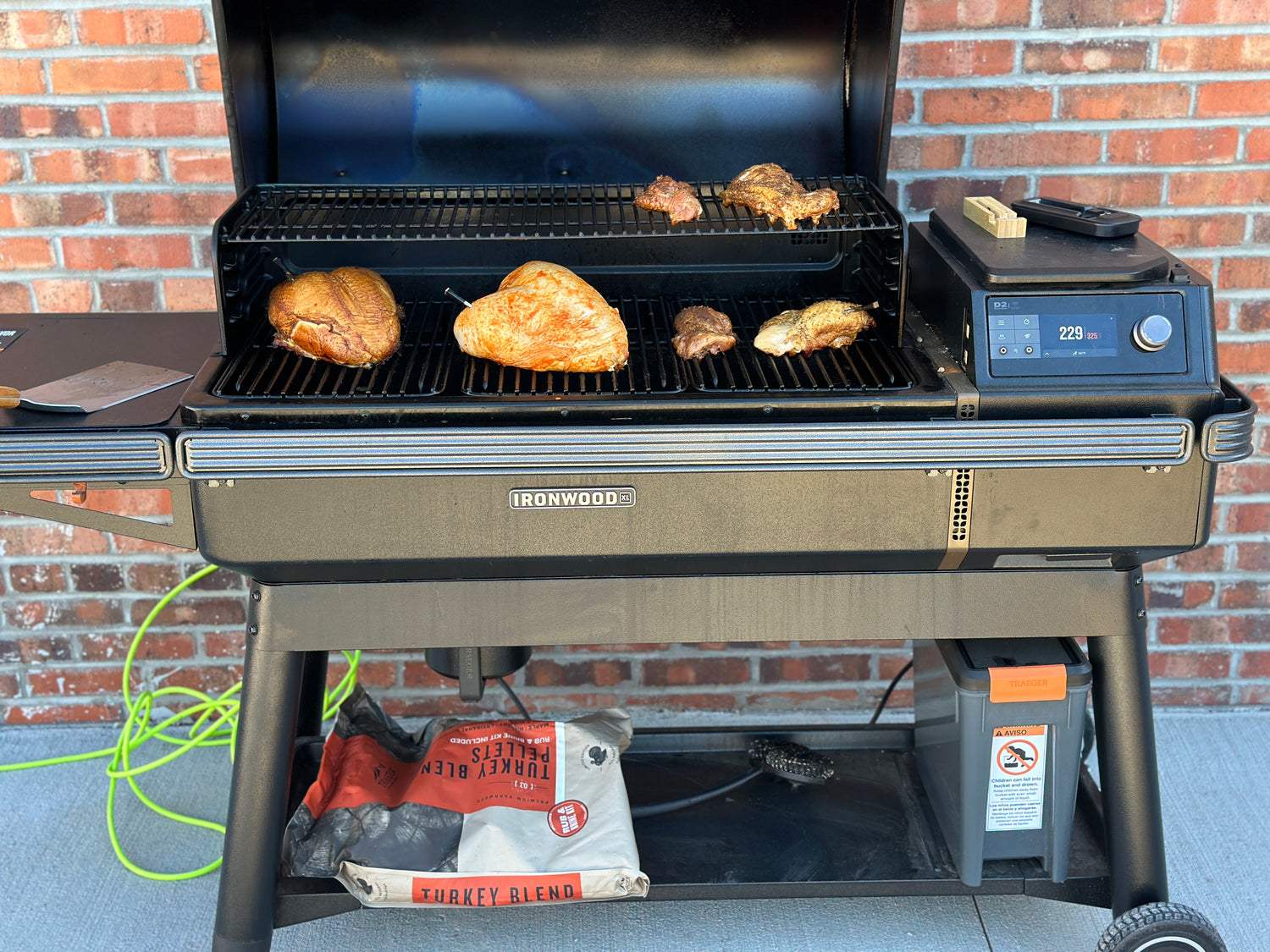 The Traeger Ironwood XL includes a low shelf, perfect for holding your pellet bin.