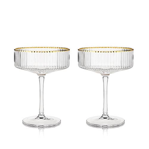 This set of coupe glasses is clear, with gold rims. 