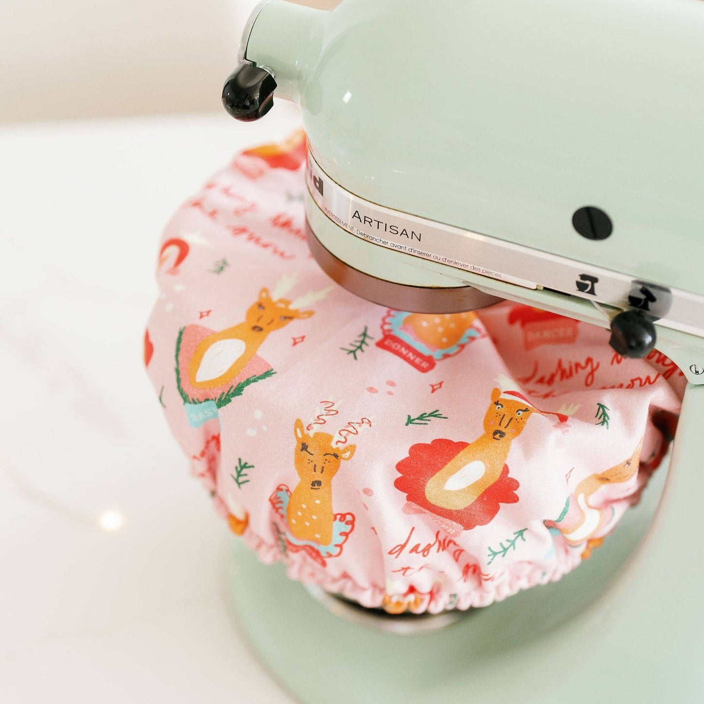 Though showing a different print, your bowl cover will fit over the bowl of your stand mixer. 