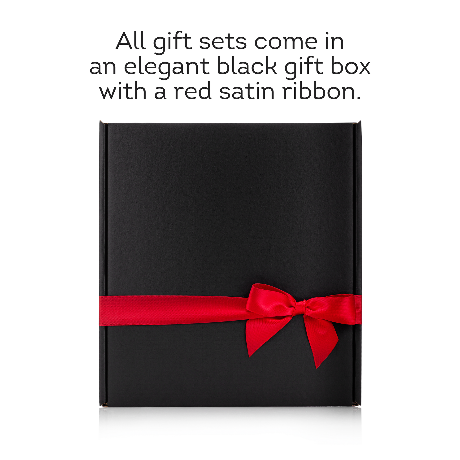 A sleek red ribbon adorns each gourmet gift box.