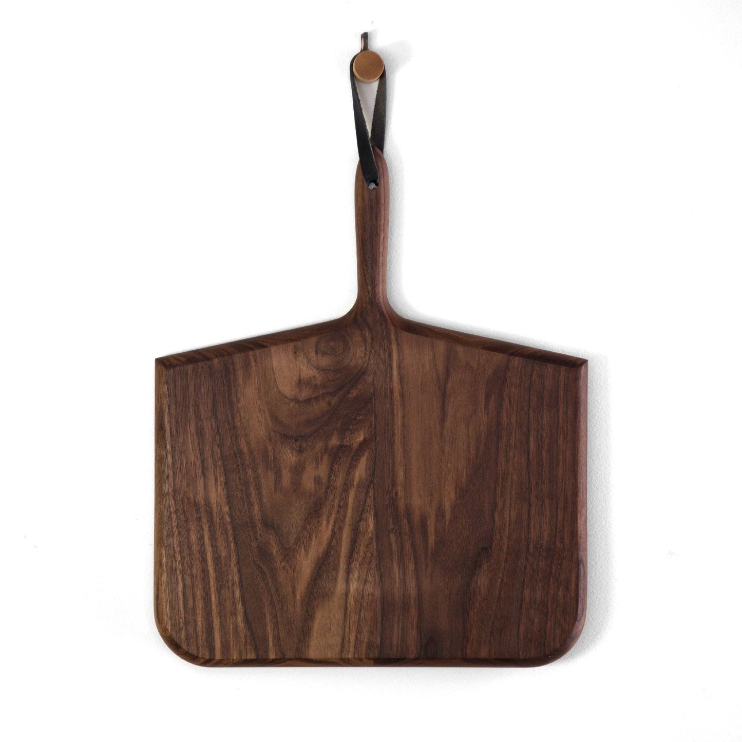 Buy one (1) "Whale Bone" cutting board shaped like a whale tail and carved from walnut wood.