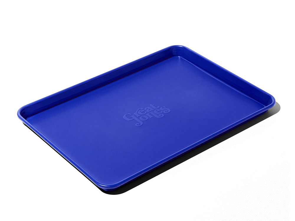 Buy one (1) half sheet baking pan in a vibrant blue called Blueberry. 