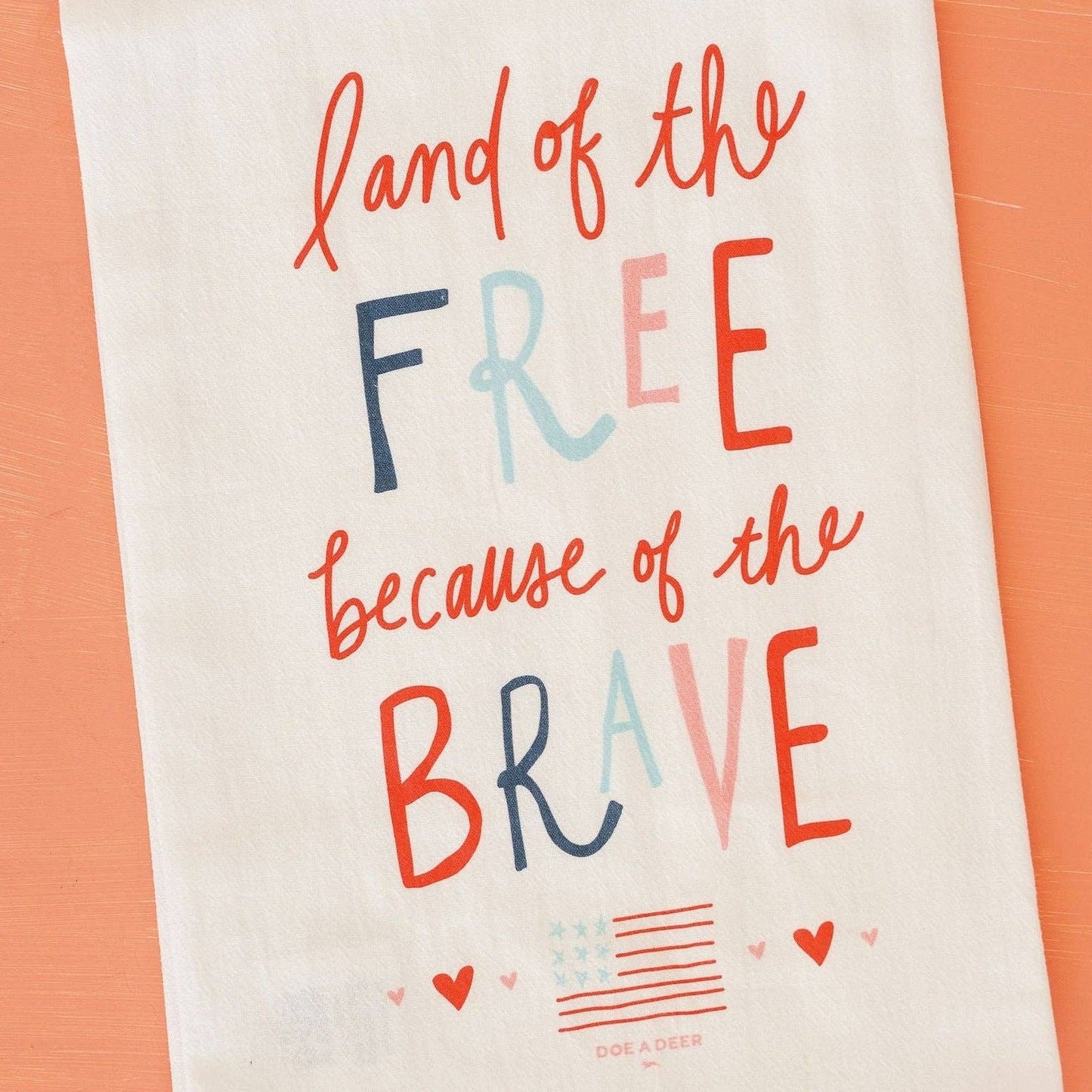 Buy one (1) patriotic kitchen towel that says, "Land of the free because of the brave."