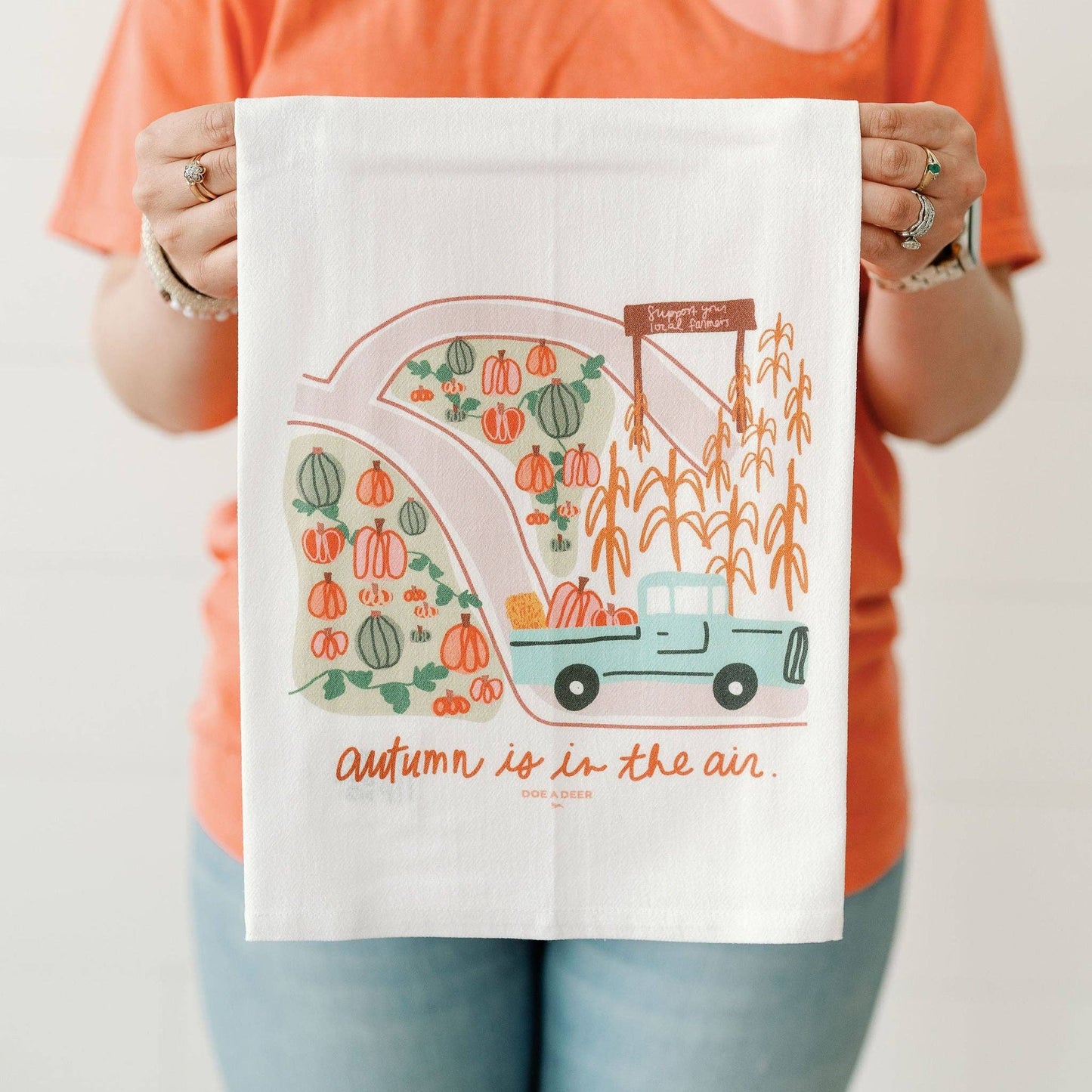 Decorate your kitchen with this design that features a pumpkin patch, corn and a blue farm truck.