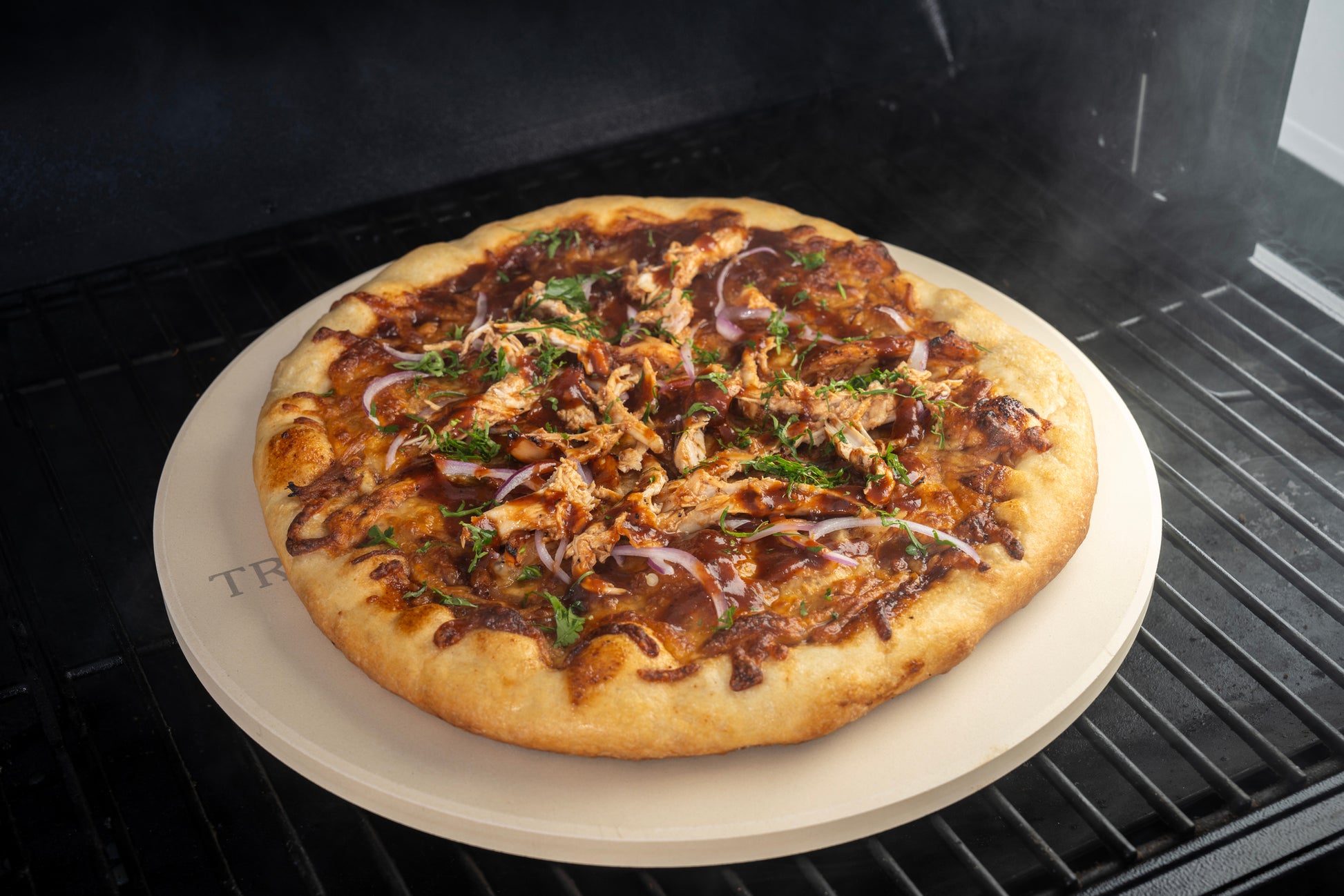 Make every pizza your way with help from a Traeger ModiFIRE pizza stone. 