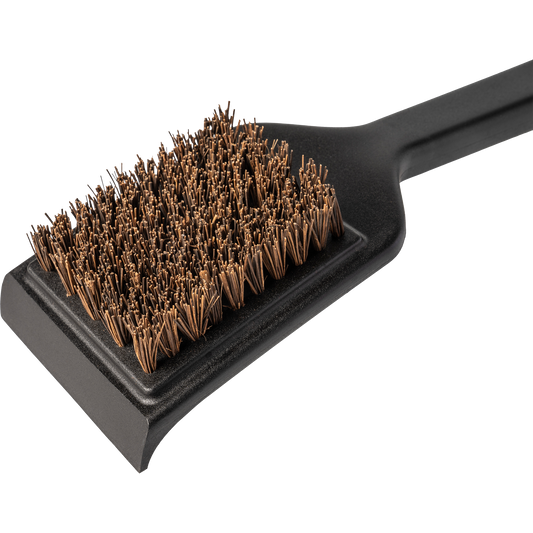 Traeger's Hot and Cold grill cleaning brush has durable Palmyra wood bristles. 
