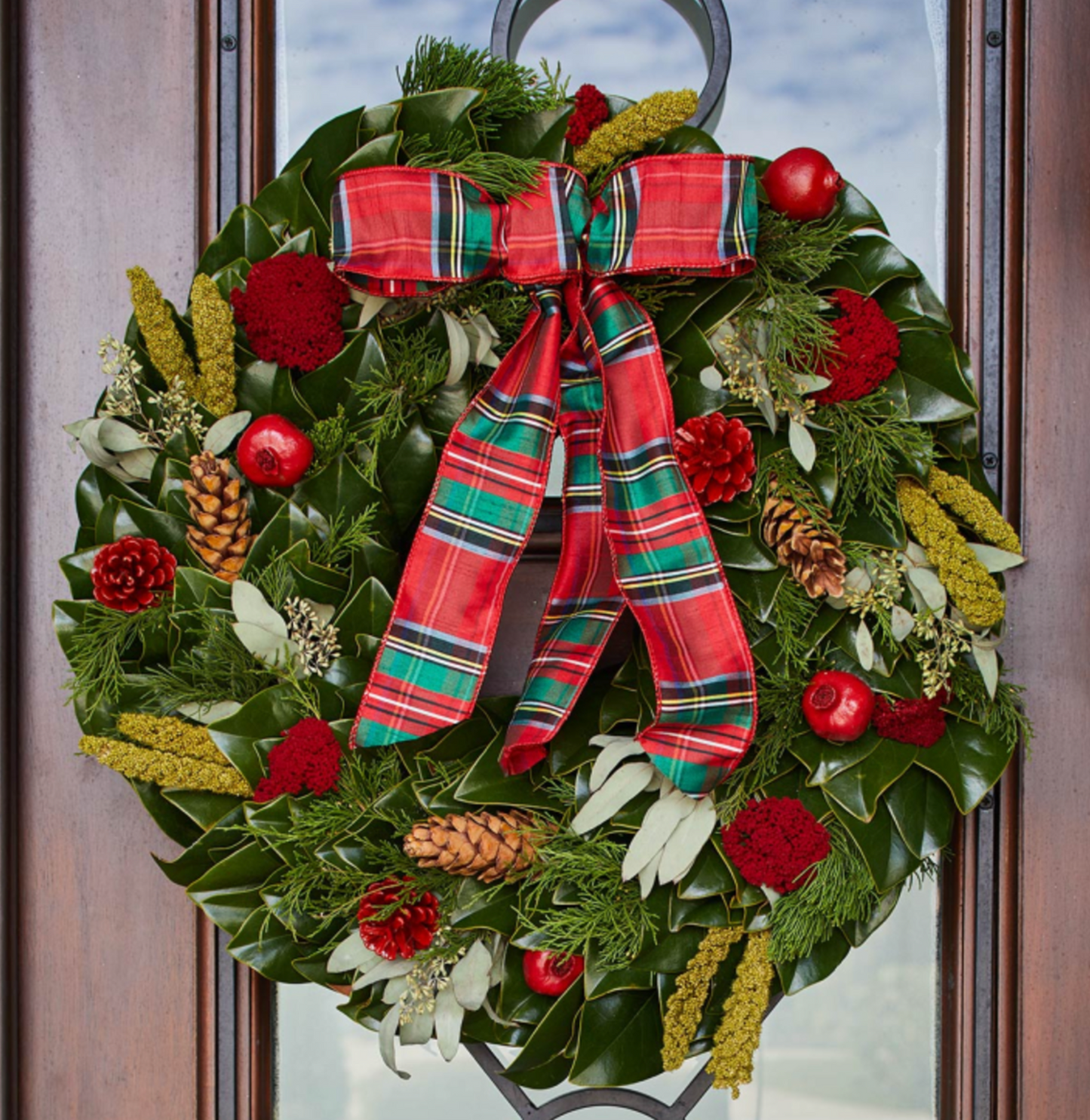 Buy 1 (one) 24" English Holiday Estate Wreath made with fresh magnolia leaves.