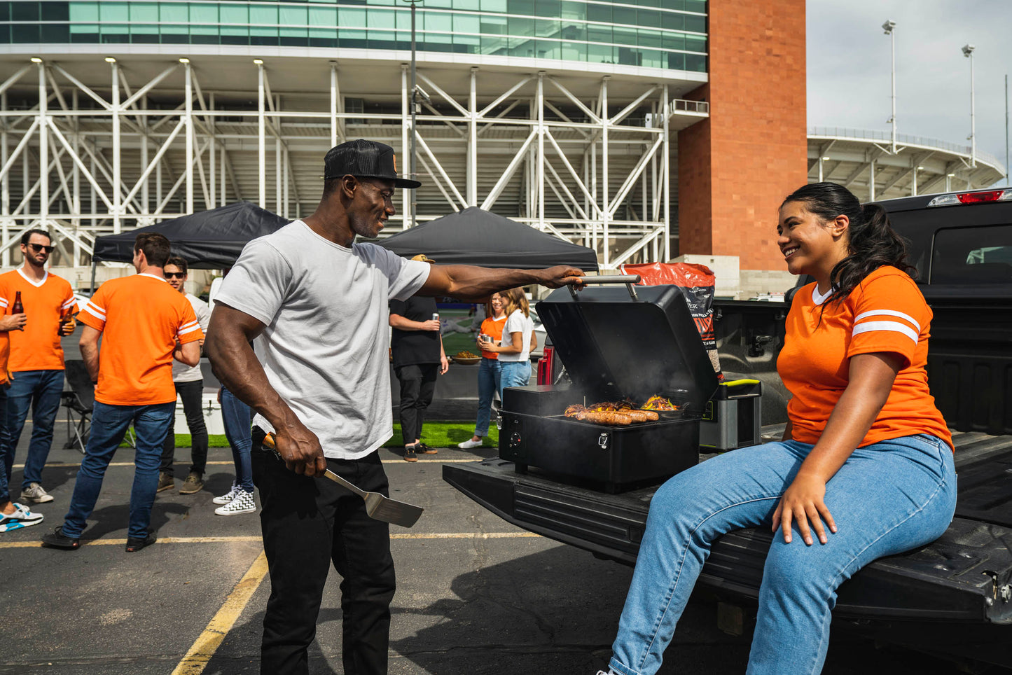 Traeger Ranger fits perfectly on the back of a pickup truck tailgate for fun cookouts on-the-go.