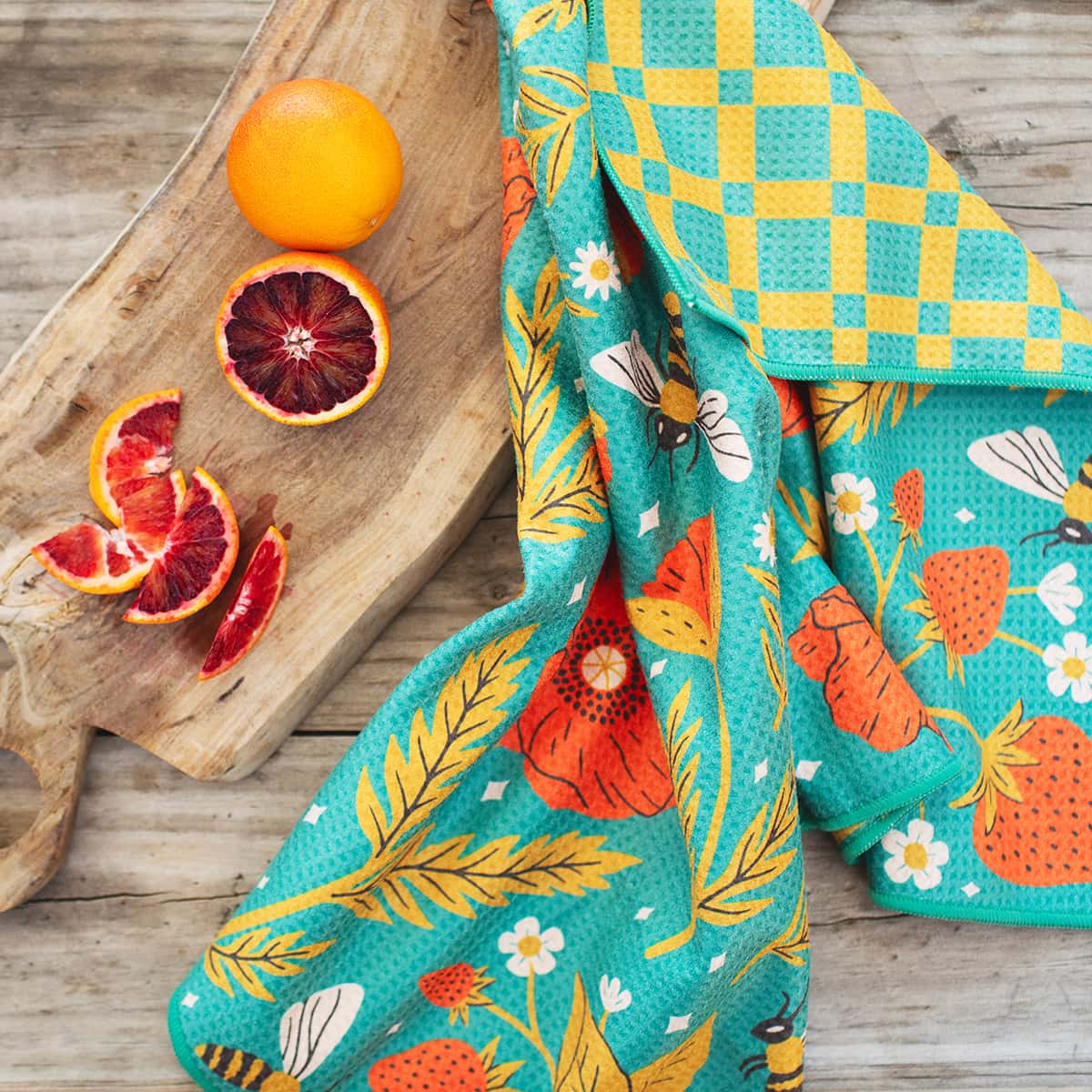 Buy 1 (one) Garden Buzz towel, with two unique designs. 