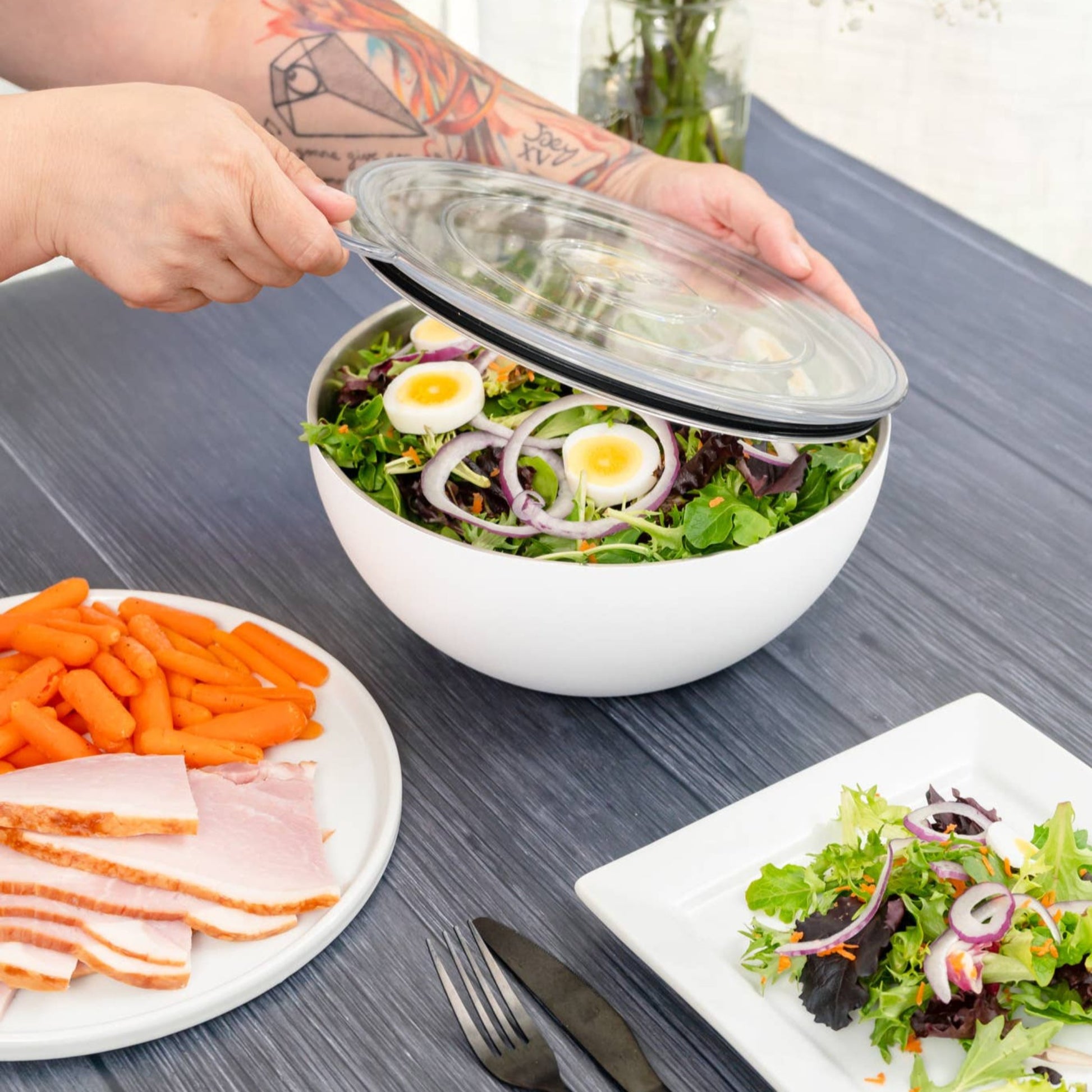 Buy one (1) insulated serving bowl to keep foods like salad at a safe temperature.