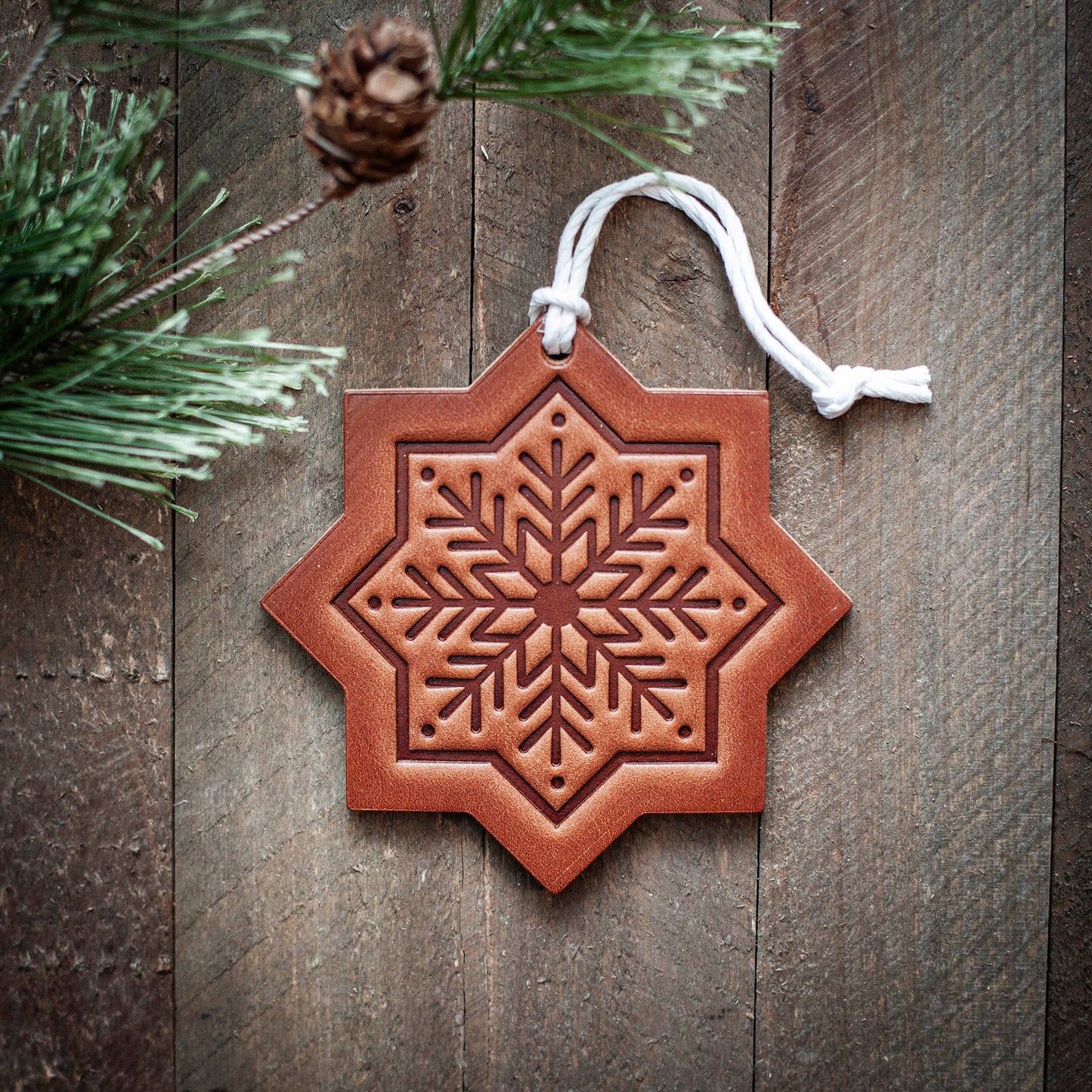 Snowflake holiday ornament in leather