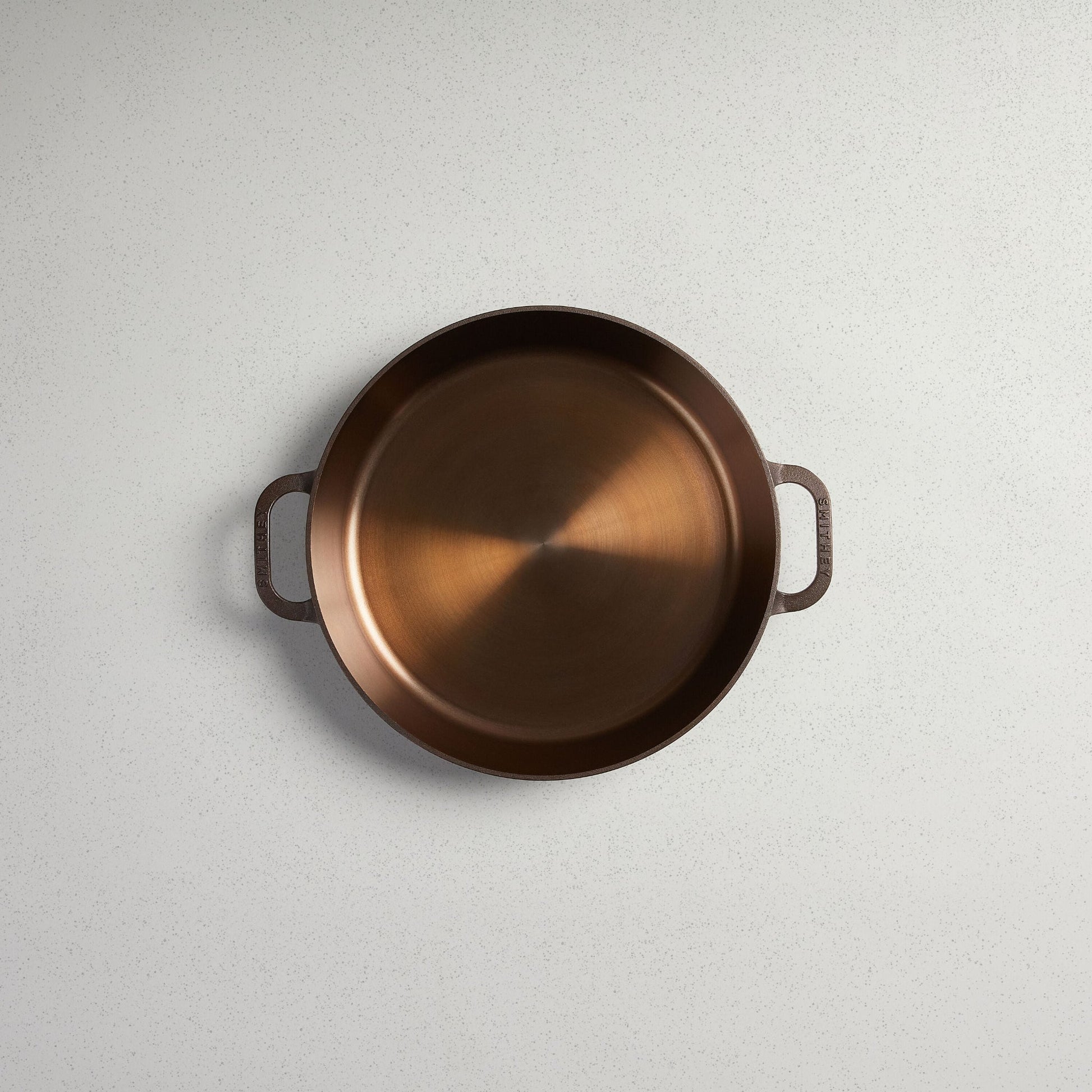 Buy 1 (one) gift set with this polished 12-inch skillet with dual handles, plus a matching glass lid.