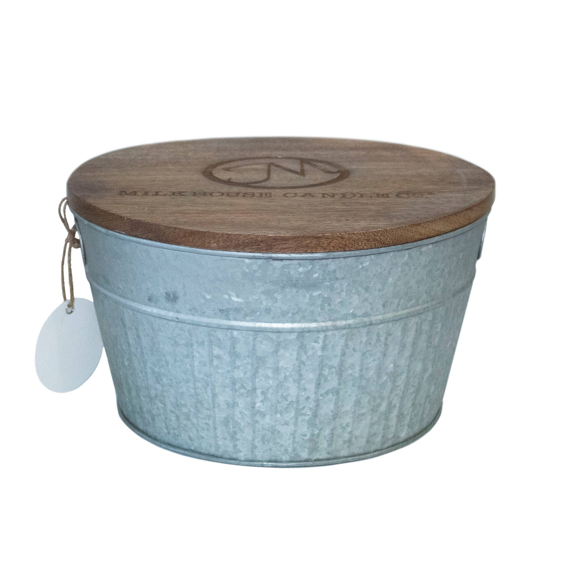 Buy 1 (one) monster-size candle in a galvanized tin with wooden lid in Saltwater scent.