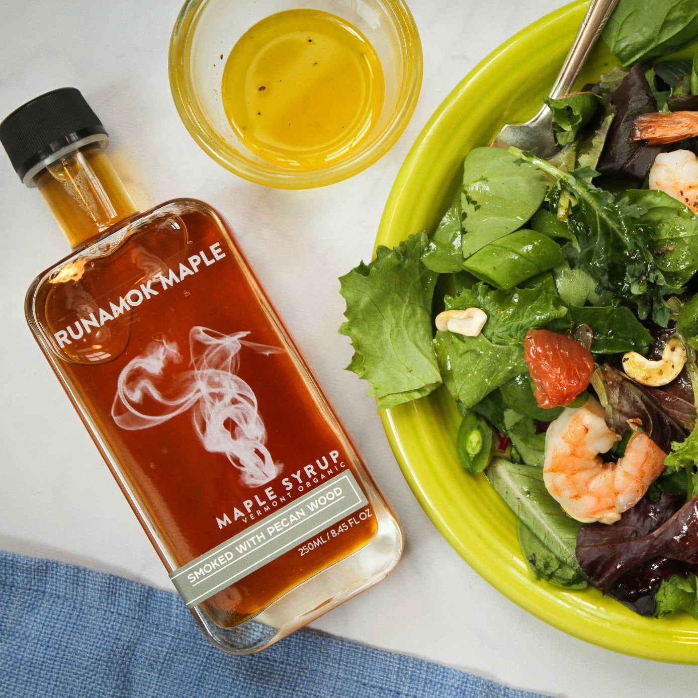 Enjoy smoked pecan maple syrup drizzled over a green salad.