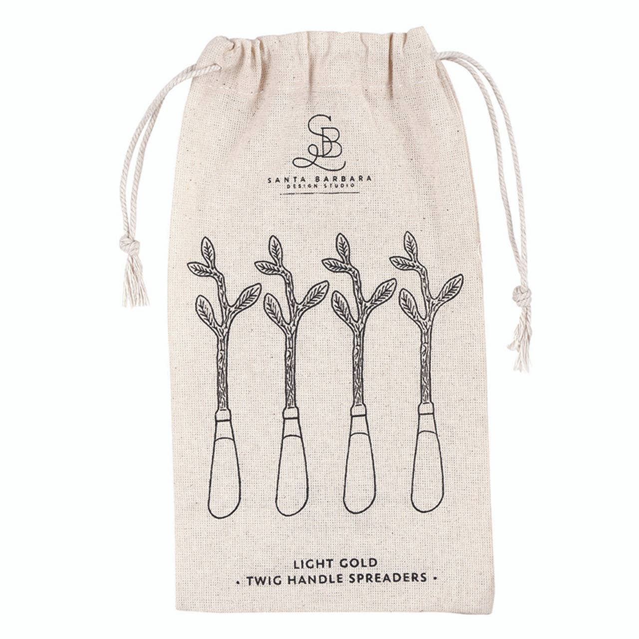 Buy 1 (one) set of light gold twig handle spreaders, which come in a cute pouch bag for gifting. 