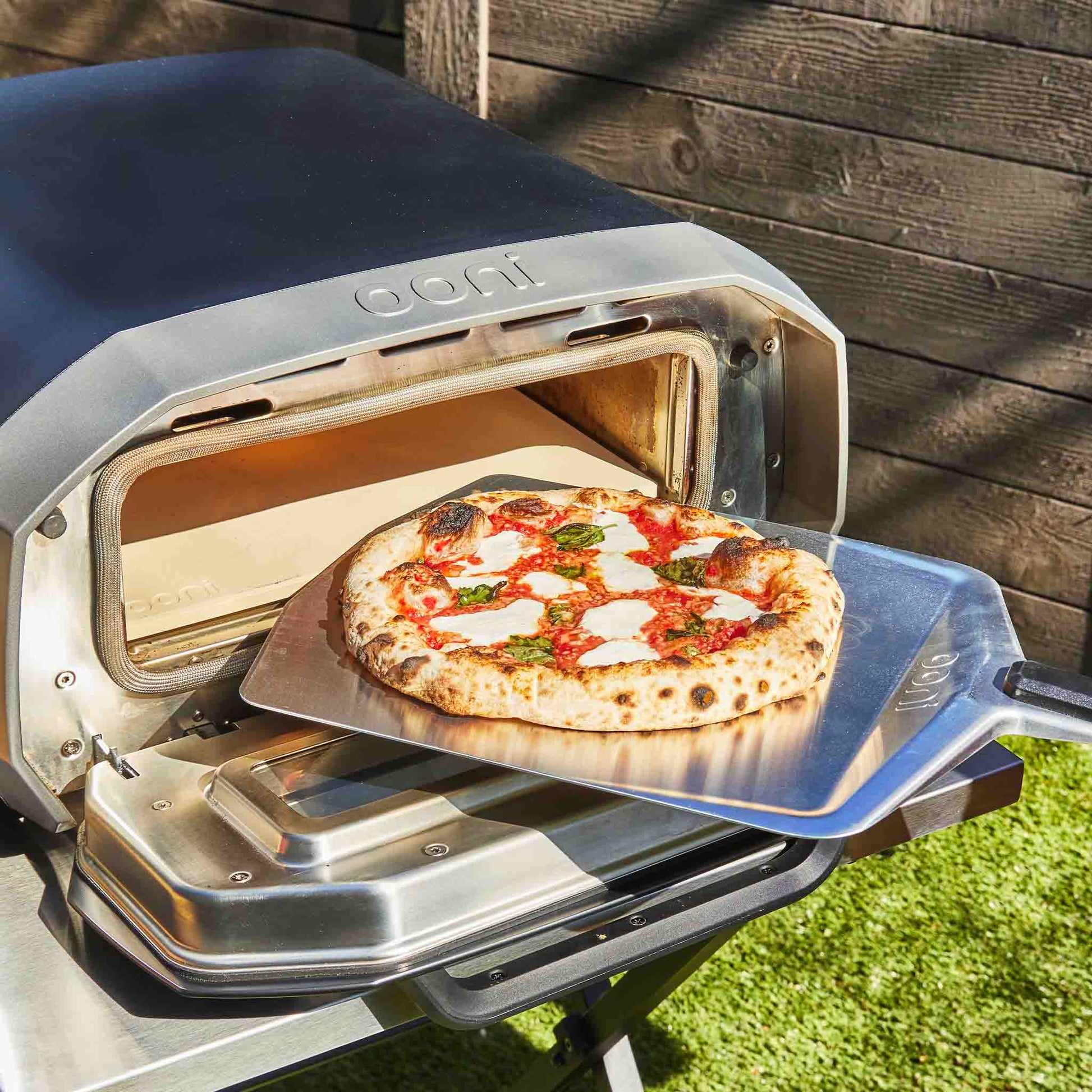 With an Ooni pizza peel, move your pizza masterpiece from oven to table. 