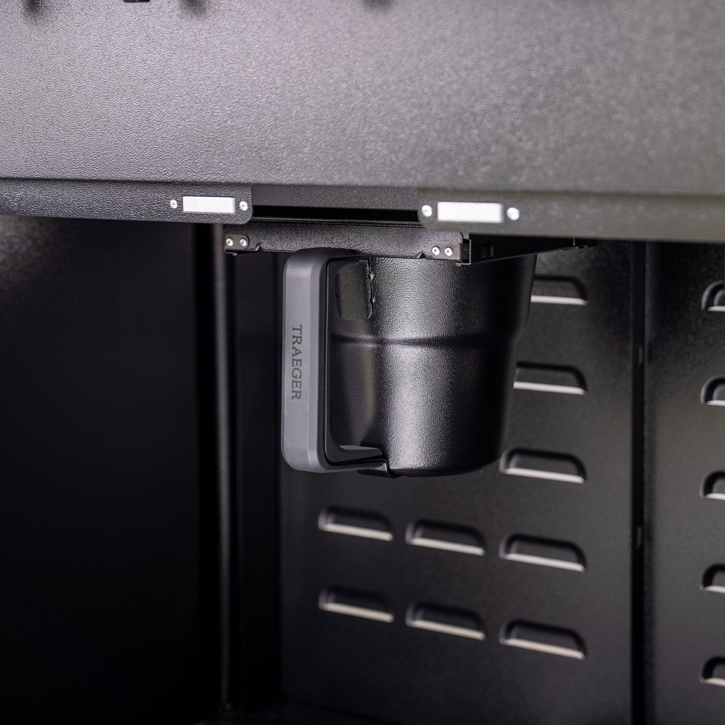 Cleanup is easy with this hidden ash container. 