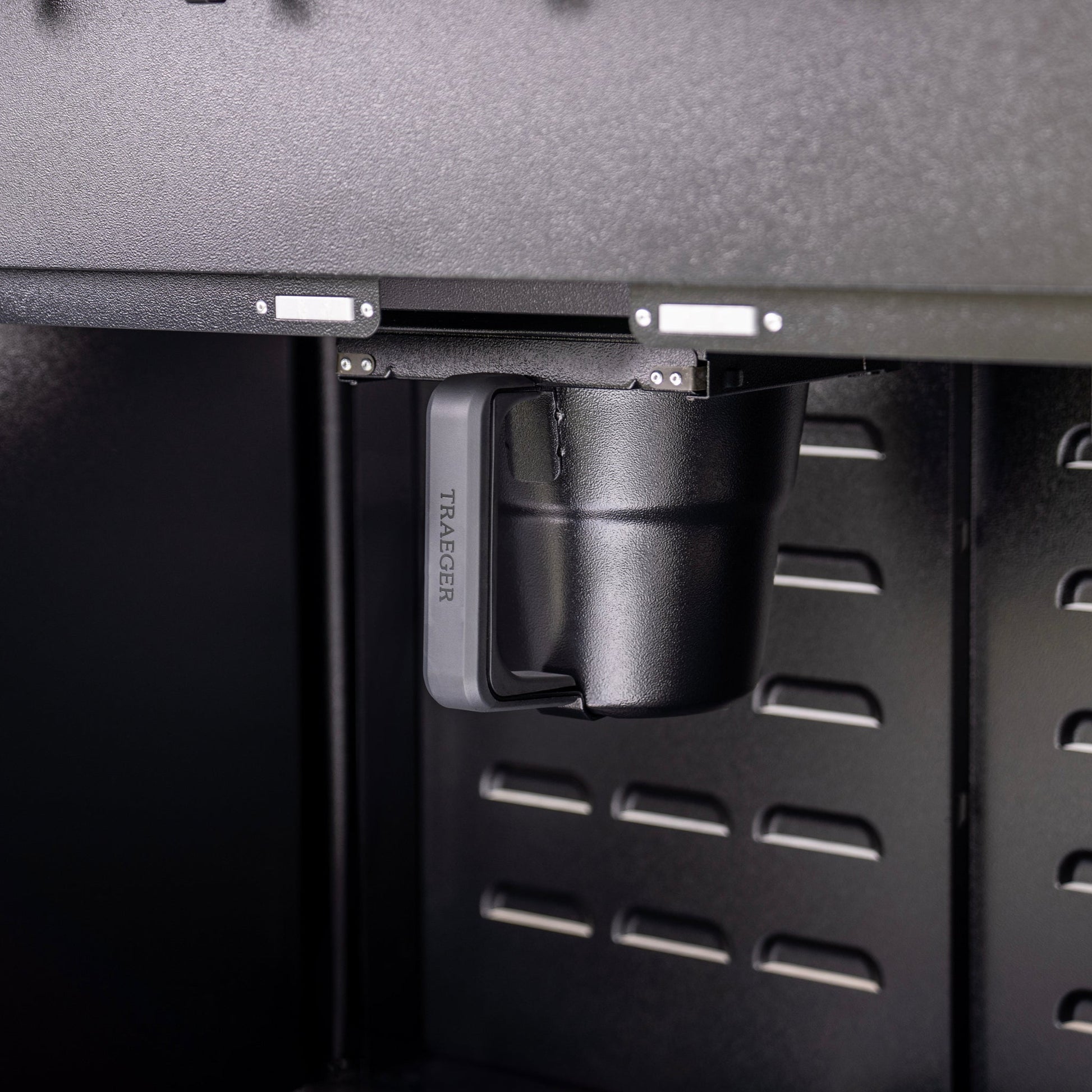 Cleanup is easy with this hidden ash container. 