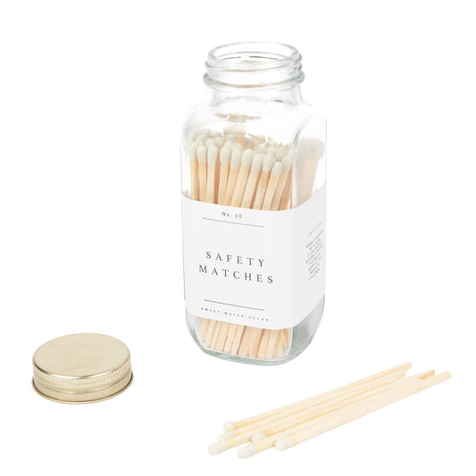 Buy one (1) jar of 60 safety matches with white tips , in an attractive glass jar.