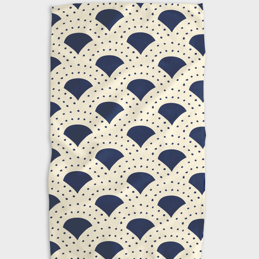 Buy one (1) kitchen tea towel with a cream-colored base and navy blue arches.