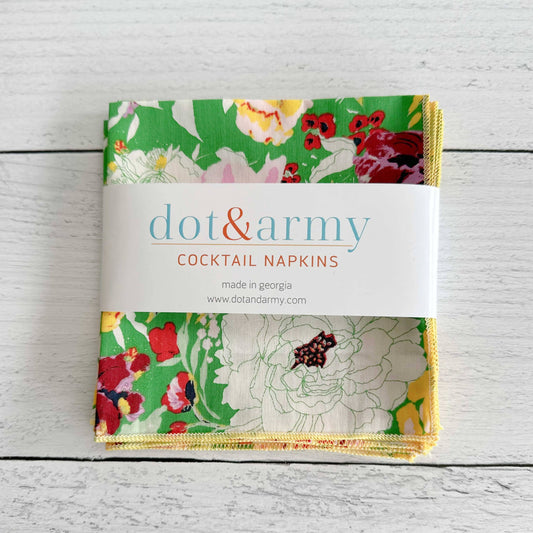 Buy one (1) set of four floral cotton cocktail napkins.