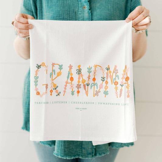 Buy one (1) flour sack towel that reads, "Grandma" with a floral design. Below, in smaller letters, it says Teacher Listener Cheerleader Unwavering Love.